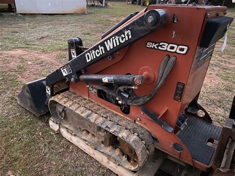 should i buy a skid steer or mini excavator|mini skid steer reviews.